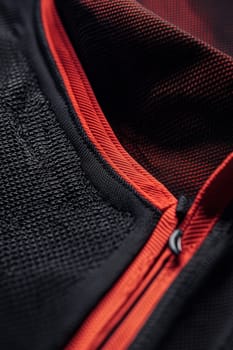 Close-up shot of a jersey's neck and logo area, emphasizing intricate stitching and fabric texture. the clean gradient background enhances the professional presentation, the craftsmanship and design details for athletic apparel.