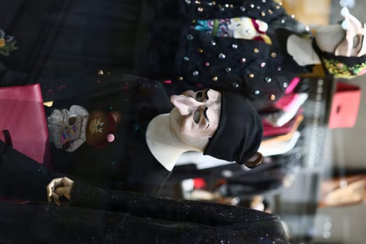 A captivating and creative fashion display that features stylish mannequins adorned in vibrant and trendy outfits