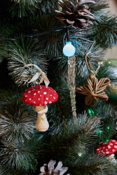 A festive holiday tree beautifully adorned with whimsical mushroom ornaments and charming pinecones