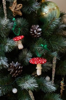 A beautifully decorated Christmas tree that features whimsical and delightful mushroom ornaments all around