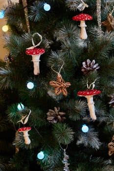 A beautifully decorated Christmas tree adorned with unique, handmade ornaments and vibrant, colorful lights