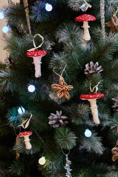 A beautifully festive Christmas tree elegantly adorned with delightful mushroom ornaments and lovely pinecones