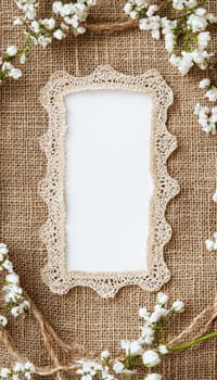Burlap and lace textures create a rustic wedding card template with a blank center. adorned with tiny white flowers and twine, this design is perfect for farmhouse style invitations or greeting cards, ideal for a romantic occasion.