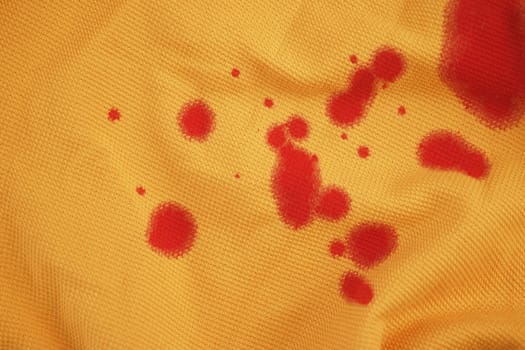 blood stains on a white shirt