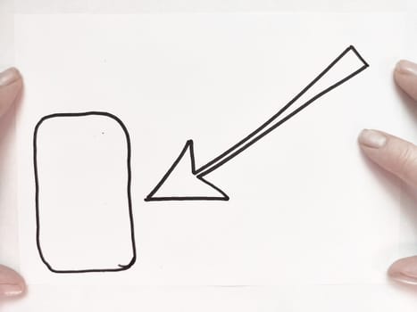 Hands display a minimalist drawing featuring a rectangle and an arrow, highlighting artistic expression on white paper.