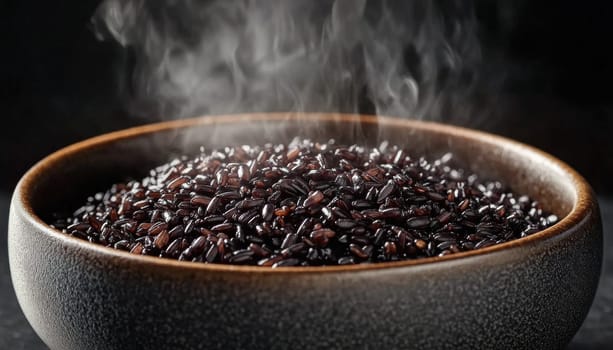 Steaming black rice is served in a bowl, representing a healthy and delicious meal
