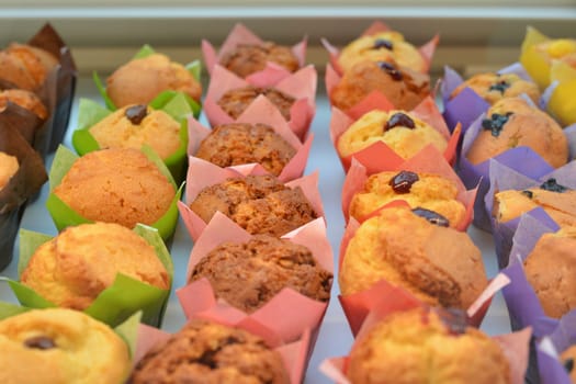 Multiple colorful nicely decorated muffins for sale