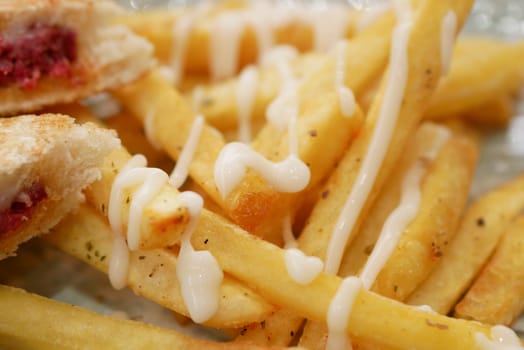 detail shot of French Fries on table .