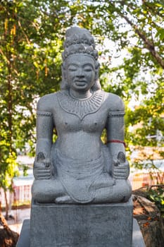 statue of a female deity in the park at Buddhist pagoda at the Cham Towers in Nha Trang, Vietnam