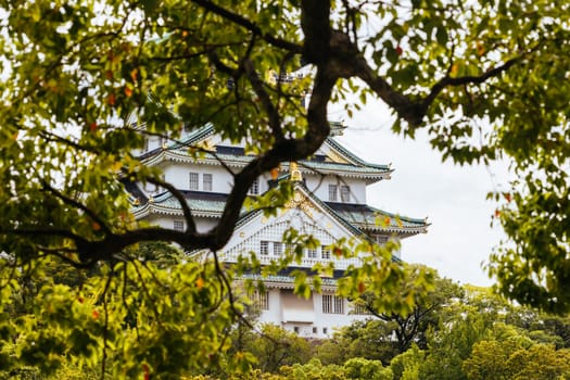 OSAKA, JAPAN - SEPTEMBER 25 2024: The iconic Osaka Castle and lush surrounds on a warm clear autumn day in Osaka, Japan on September 25th 2024