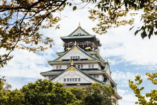 OSAKA, JAPAN - SEPTEMBER 25 2024: The iconic Osaka Castle and lush surrounds on a warm clear autumn day in Osaka, Japan on September 25th 2024