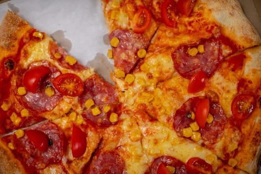Enjoy a mouthwatering pizza topped with pepperoni, cheese, cherry tomatoes, and spices that enhance its flavor