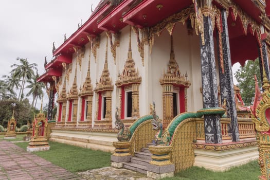 A breathtaking and stunning view of a traditional Thai temple that is beautifully adorned with intricate decorations
