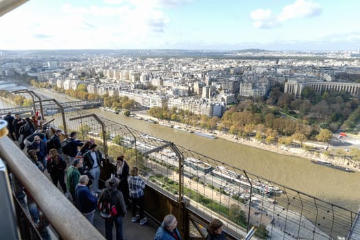 The Eiffel Tower offers a breathtaking view of Paris, highlighting the River Seine and the stunning cityscape. Paris, France - October 24, 2024