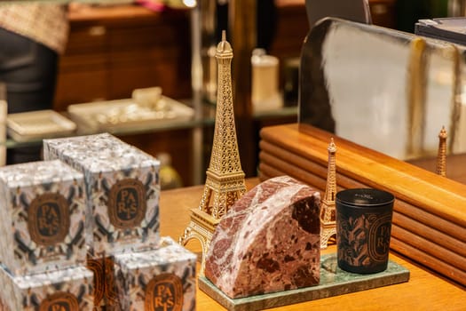 Paris perfume with the Eiffel Tower in the perfume department of the shopping mall. Paris, France - December 20, 2024