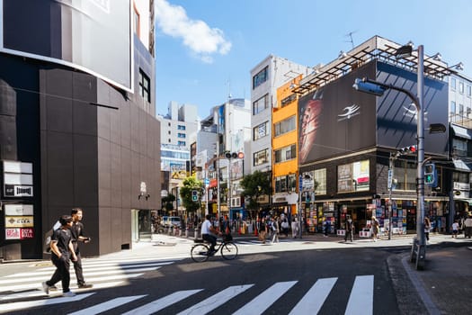 OSAKA, JAPAN - SEPTEMBER 26 2024: The trendy and fashionable Amerikamura district on a clear autumn day in Osaka, Japan