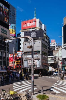 OSAKA, JAPAN - SEPTEMBER 26 2024: The trendy and fashionable Amerikamura district on a clear autumn day in Osaka, Japan