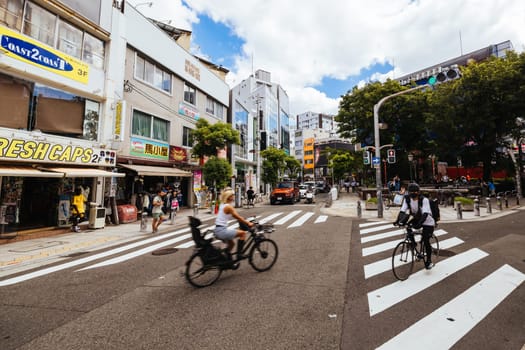 OSAKA, JAPAN - SEPTEMBER 26 2024: The trendy and fashionable Amerikamura district on a clear autumn day in Osaka, Japan