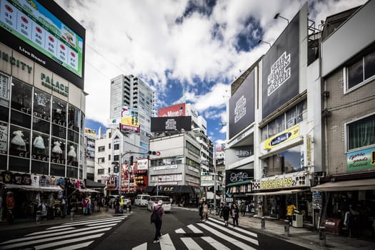 OSAKA, JAPAN - SEPTEMBER 26 2024: The trendy and fashionable Amerikamura district on a clear autumn day in Osaka, Japan