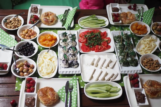 Variety of Fresh and Delicious Food Arrangement on a Wooden Table.