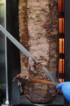 Close-Up of Juicy Shawarma Meat Being Sliced,