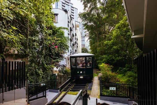 HONG KONG, CHINA - SEPTEMBER 29, 2024: The famous and popular Peak Tram as it ascends Victoria Peak in Hong Kong, China