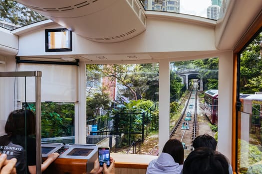 HONG KONG, CHINA - SEPTEMBER 29, 2024: The famous and popular Peak Tram as it ascends Victoria Peak in Hong Kong, China