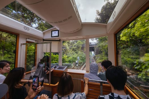 HONG KONG, CHINA - SEPTEMBER 29, 2024: The famous and popular Peak Tram as it ascends Victoria Peak in Hong Kong, China