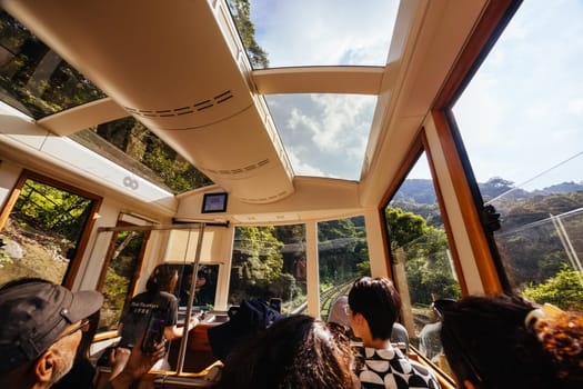 HONG KONG, CHINA - SEPTEMBER 29, 2024: The famous and popular Peak Tram as it ascends Victoria Peak in Hong Kong, China
