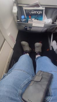 15 October 2024 Tel-Aviv Israel Ben Gurion airport. Airplane legroom tray. High quality photo