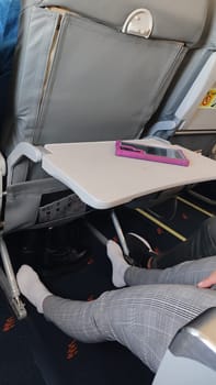 15 October 2024 Tel-Aviv Israel Ben Gurion airport. Airplane legroom tray. High quality photo