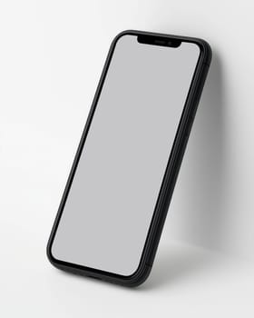 A mobile phone on a white background. Selective focus.