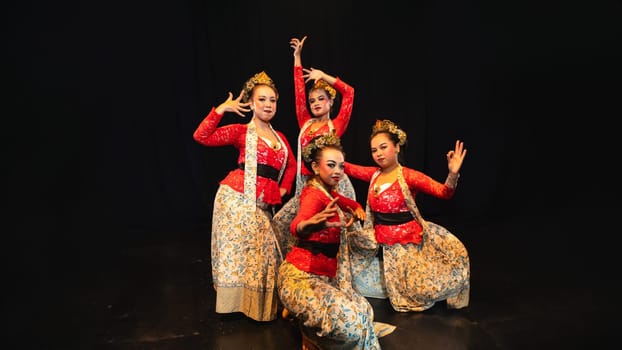 A group of traditional Balinese dancers showed the harmony of the dancers' movements in red uniforms creating stunning visuals on stage