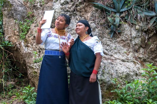 Connecting Across Cultures: Indigenous Wisdom Meets Digital Education in the Ecuadorian Rainforest. High quality photo