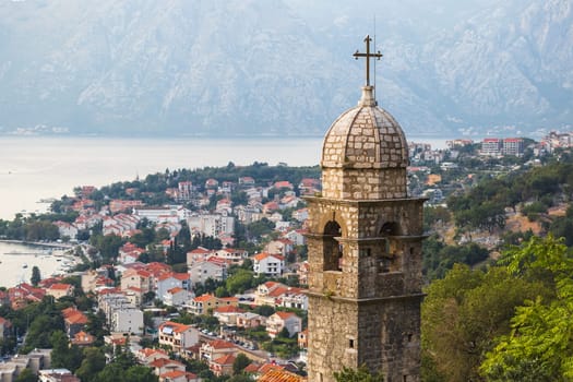 Church Our Lady of Remedy on the hill tower in the old city of Kotor and the Kotor Bay in Montenegro