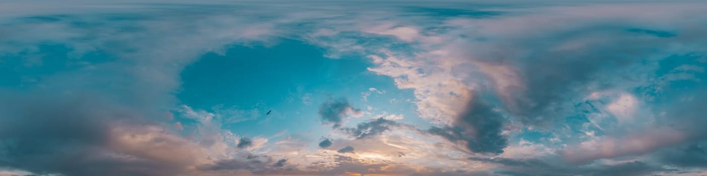 Bright sunset sky panorama with Cirrus clouds. Seamless hdr spherical equirectangular 360 panorama. Sky dome or zenith for 3D visualization, game and sky replacement for aerial drone 360 panoramas.