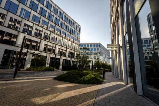 Modern Glass Building In European City Landscape Stands Tall And Majestic