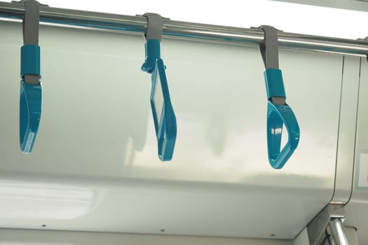 Blue grip handles in public transport greatly enhance the travel experience for commuters