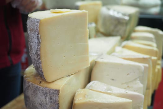 slice of cheese selling at local market ,