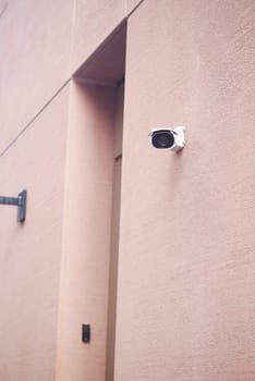 A wallmounted security camera offering extensive surveillance for diverse needs and locations