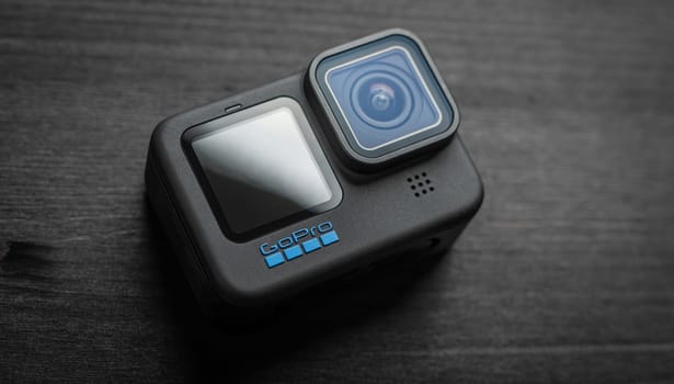 Poznan, Poland - 30 November 2022: Action camera GoPro 11 on a dark table