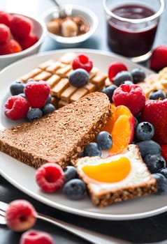 A vibrant and healthy breakfast featuring fruits, grains, and nuts, beautifully arranged, perfect for energizing mornings and wellness lifestyles.