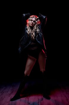 A striking portrait featuring bold styling and vibrant lighting, perfect for contemporary fashion themes.