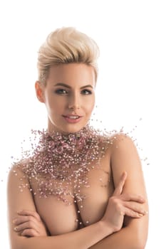 Gorgeous woman topless wearing only bijouterie waist up isolated portrait