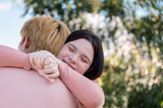 A loving couple shares a heartfelt embrace in a serene outdoor setting celebrating their bond on Valentine Day.