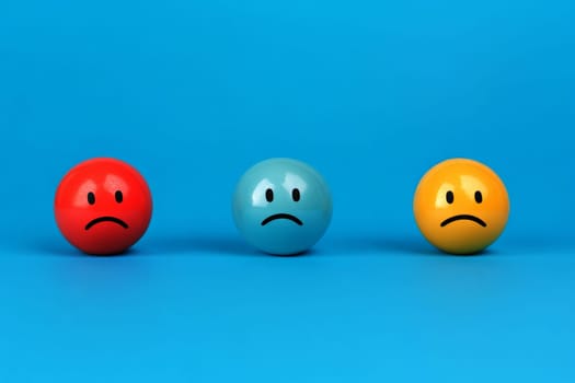 3d sad blue emoji on blue background. blue mon day concept..