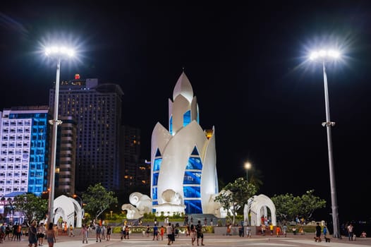 Tourist attraction is the Lotus Tower or Thap Tram Huong Tower on the central square at night in Asia. Nha Trang, Vietnam - September 2, 2024