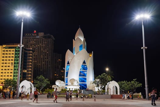 Popular tourist attraction is the Lotus Tower or Thap Tram Huong Tower on the central square at night in Asia. Nha Trang, Vietnam - September 2, 2024
