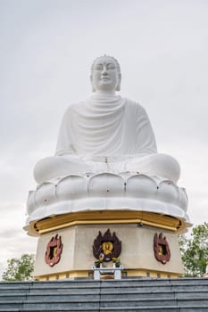 big white Buddha statue at the Buddhist Long Son Pagoda in Nha Trang in Vietnam in Asia
