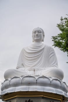 large white Buddha statue at the Long Son Buddhist Pagoda in Nha Trang in Vietnam in Asia